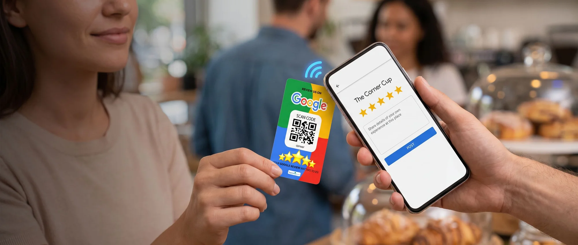 A bakery counter where a woman holds a Tapping Tags review card near an NFC contact point