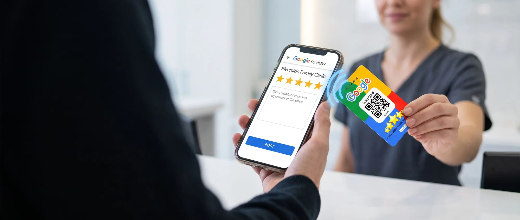 A clinic reception desk with a phone open to a Google review page, and a Tapping Tags review card held near its top corner