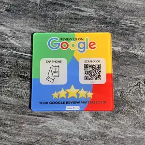 The complete front of the Google Review acrylic tag showing its tap and scan panels